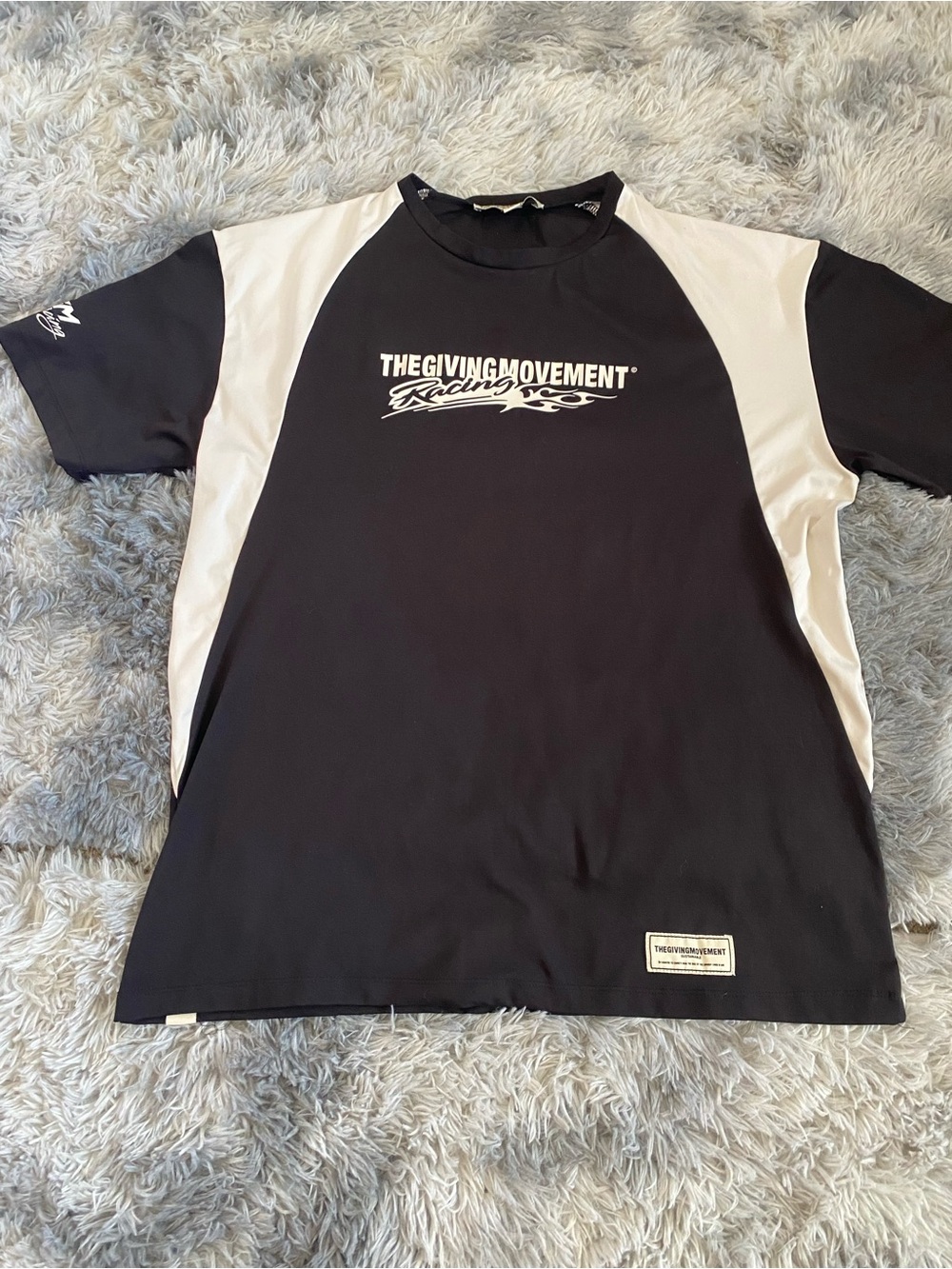 The Giving Movement Racing Short Sleeve Shirt